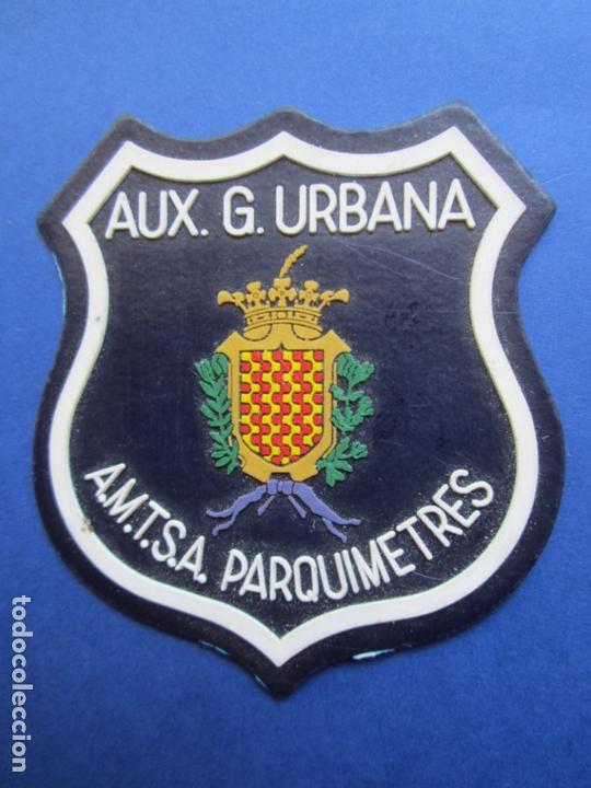 Militaria: parche , AUX. G. URBANA , A,M.T.S.A. PARQUIMETRES