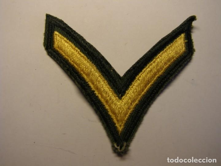 Militaria: Parche de tela bordado del Ej&eacute;rcito Norteamericano. N&ordm; 7.