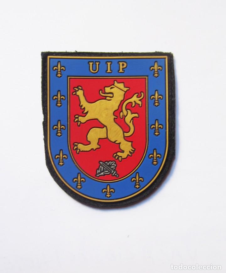 Militaria: EMBLEMA DE BRAZO DE PLASTICO DE LA UIP. - Foto 1