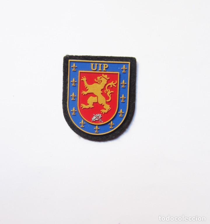 Militaria: EMBLEMA DE PECHO DE PLASTICO DE LA UIP. - Foto 1