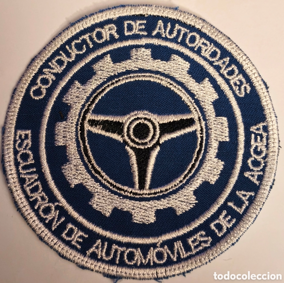 Militaria: PARCHE EMBLEMA DE BRAZO BORDADO AZUL DE CONDUCTOR DE AUTORIDADES DEL ESCUADR&Oacute;N DE AUTOM&Oacute;VILES ACGEA