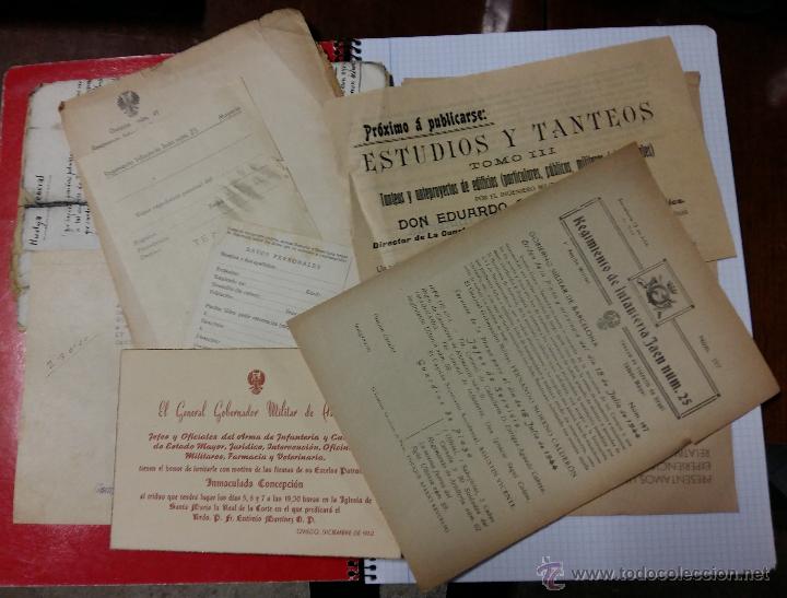 Militaria: 14 documentos, sobre, fichas, etc y poes&iacute;a manuscrita sat&iacute;rica sobre huelga general, pegado sobre...