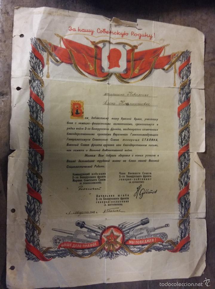 Militaria: Documento doble folio, Reconocimiento por combates a una soldado, 1945