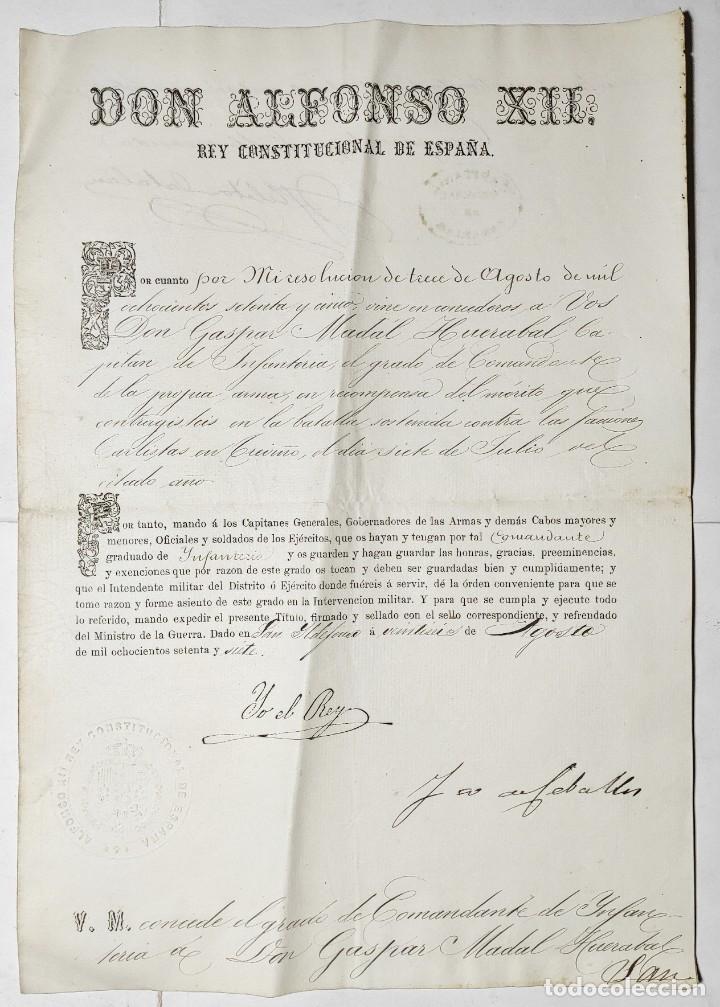 Militaria: COMUNICADO DE ASCENSO A COMANDANTE DE INFANTERIA. ALFONSO XII. 1877.