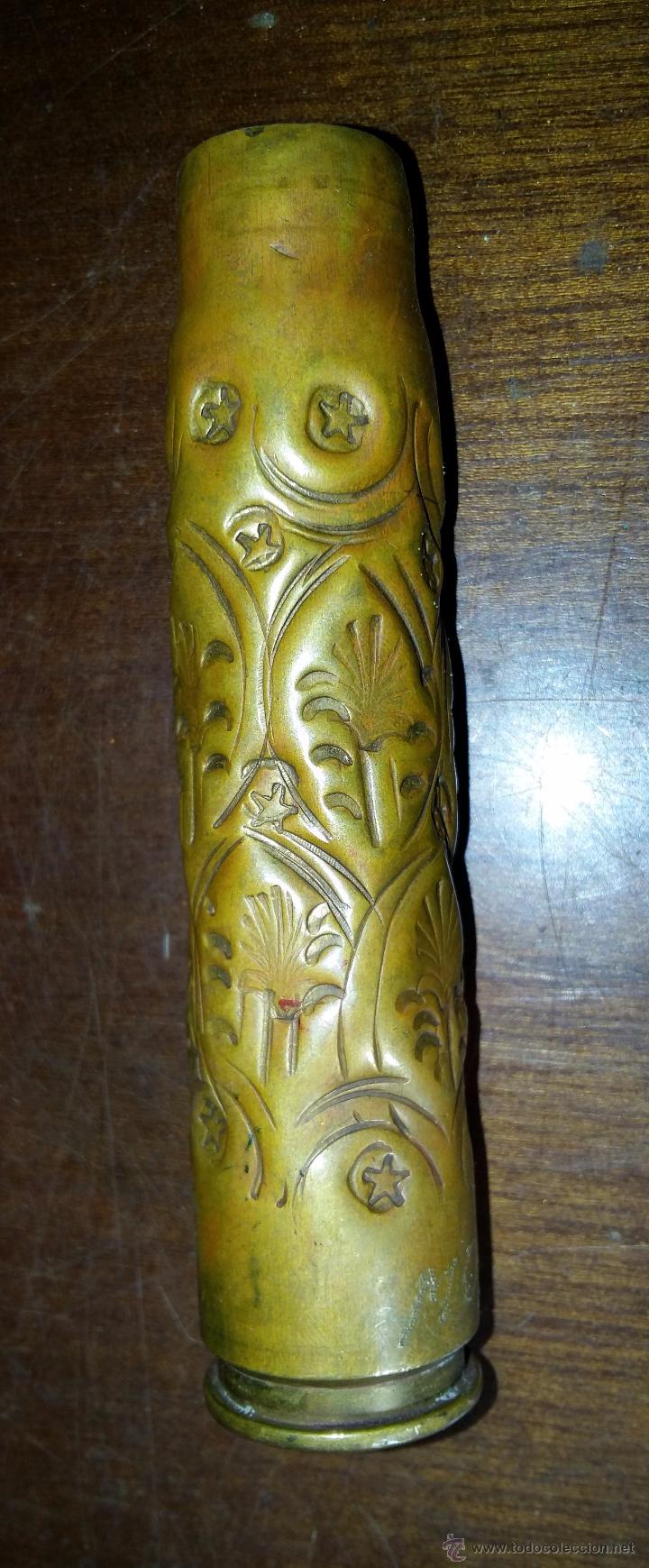 Militaria: Vaina de 20 mm decorada, MOSTAR