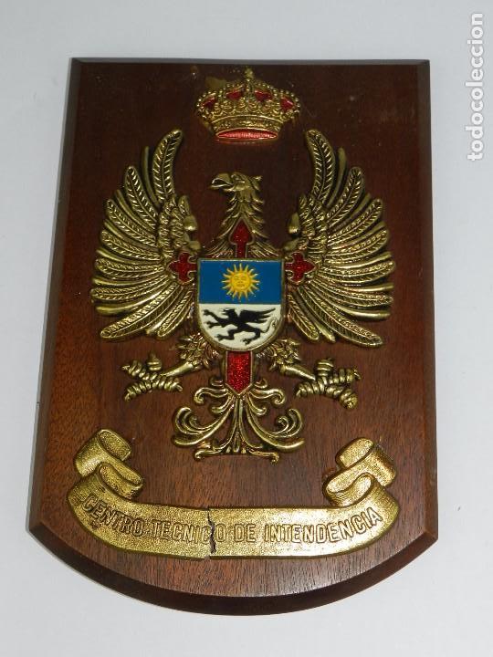 Military Antiques: METOPA CENTRO TECNICO DE INTENDENCIA, TIENE UNA RAJA EN LA PLACA DEL TEXTO, MIDE 21 X 14 CMS.