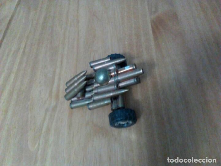 Military Antiques: Objeto hecho de balas