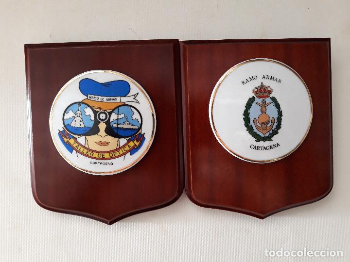 Military Antiques: Pareja de peque&ntilde;as metopas de mano. RAMO DE ARMAS - TALLER DE OPTICA. (Cartagena)