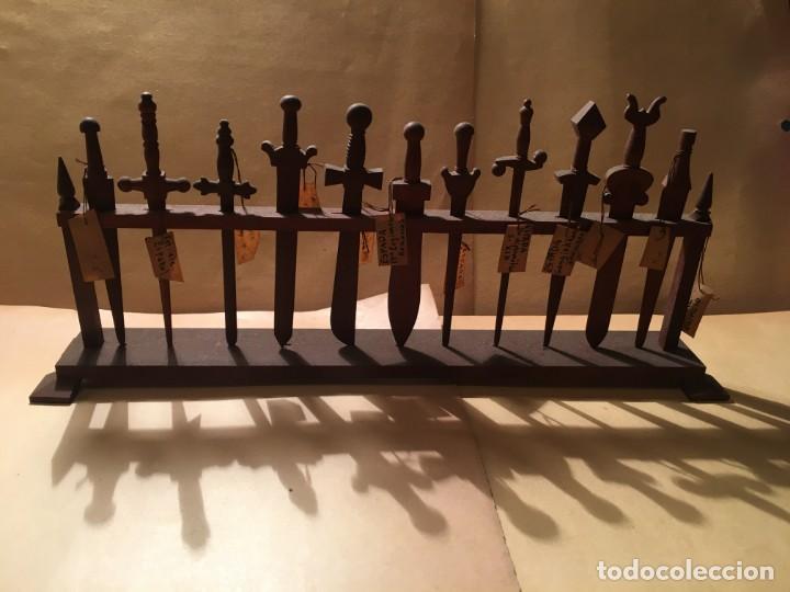 Military Antiques: ANTIGUA COLECCION DE ESPADAS REALIZADAS EN MADERA A MANO EN CAMPO DE CONCENTRACION 11 ESPADAS 23,5