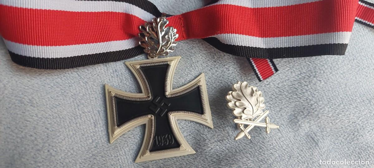 Military Antiques: CRUZ DE HIERRO CON HOJAS DE ROBLE CON SU CINTA M&Aacute;S ENGANCHE DE HOJAS DE ROBLE Y ESPADAS CON MARCAJE