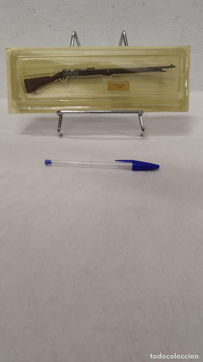 Militaria: ANTIGUA ARMA Fusil Lebel -1886- DE COLECCION EN MINIATURA EN SU BLISTER SIN ABRIR