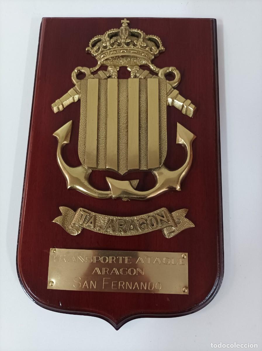 Militaria: Metopa naval. TRANSPORTE DE ATAQUE ARAGON - SAN FERNAND0. Bronce sobre madera.
