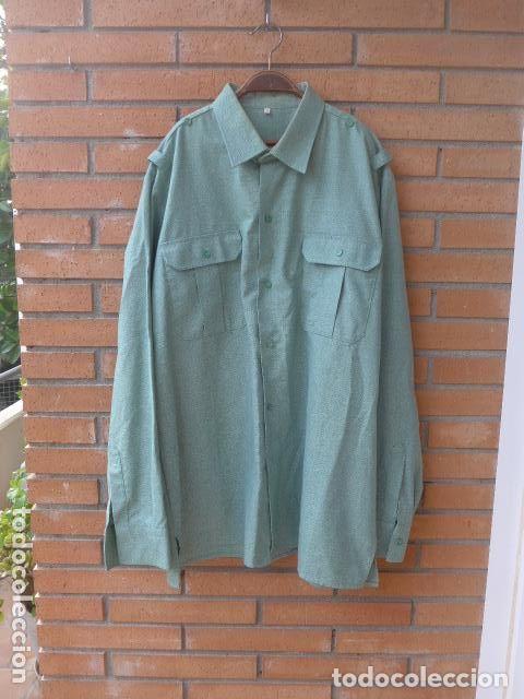 Militaria: Antigua guerrera o camisa de la Legion de tejido de calidad, original.