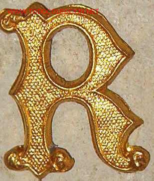 Militaria: R dorada de 2 cms - Foto 1
