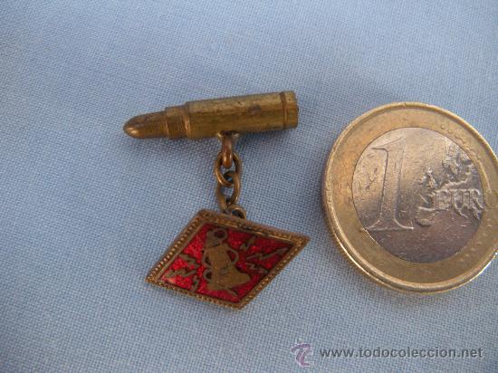 Militaria: ANTIGUO GEMELO MILITAR CON BALA PROYECTIL - Foto 1