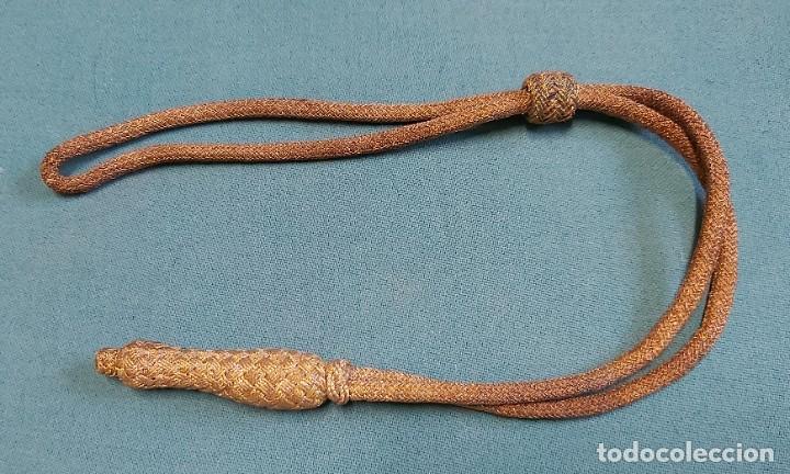 Militaria: Fiador de sable - Foto 1