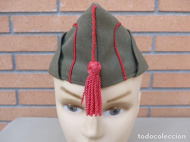 Militaria: ANTIGUA GORRA CON OREJERAS GORRILLO EPOCA FRANCO