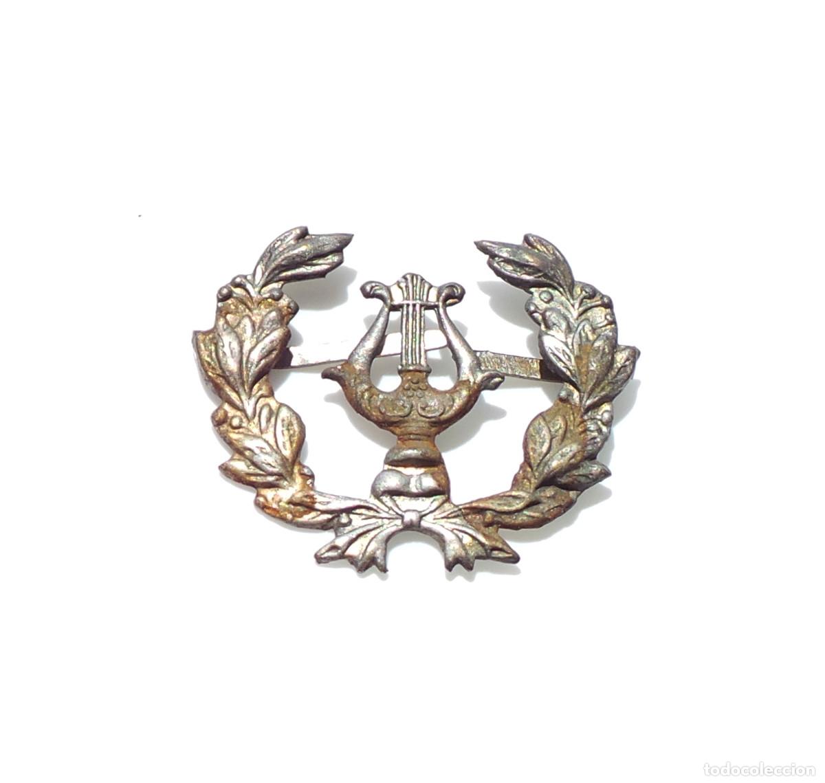 Militaria: DISTINTIVO DE CUELLO M&Uacute;SICO.