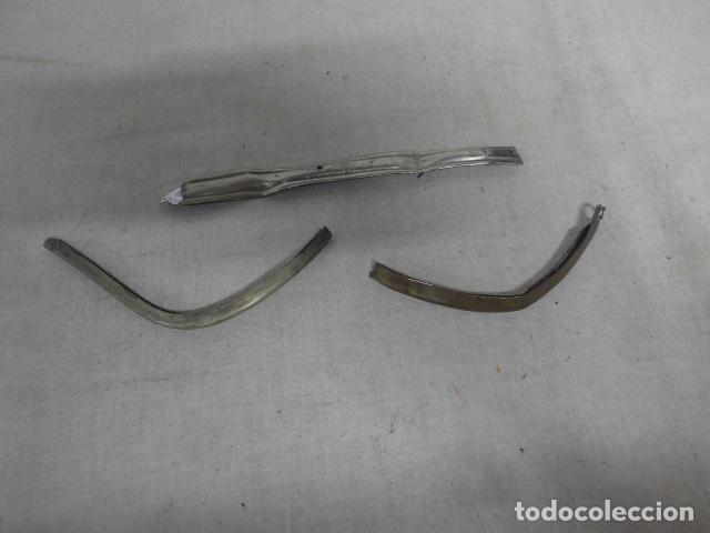 Militaria: Lote de 3 partes de cerquillo metalico de visera de gorra o complemento de casco de pincho
