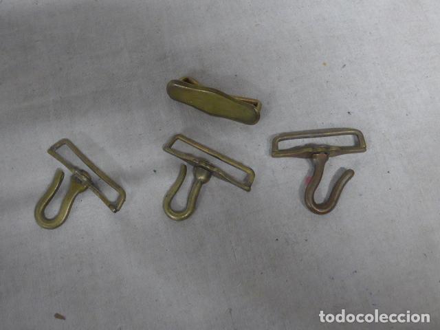 Militaria: Lote de 4 antiguos enganches de cinturon espa&ntilde;ol, originales.