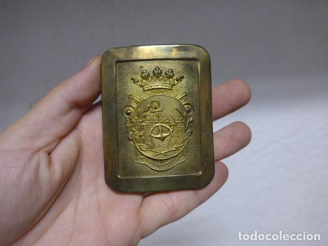 Militaria: Antigua hebilla de puertos, canales y caminos, sobrepuesta a otra de epoca. Franquista.