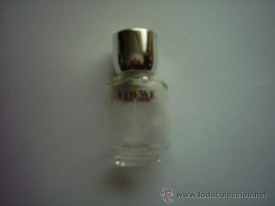 Miniaturas de perfumes antigos: FRASCO DE EAU DE TOILETTE LOEWE POUR HOMME. 50 ML. VAC&Iacute;O. 9 Cm.