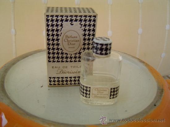 Miniaturas de perfumes antiguos: Interesante eau de Toilette Diorissimo vacia con caja