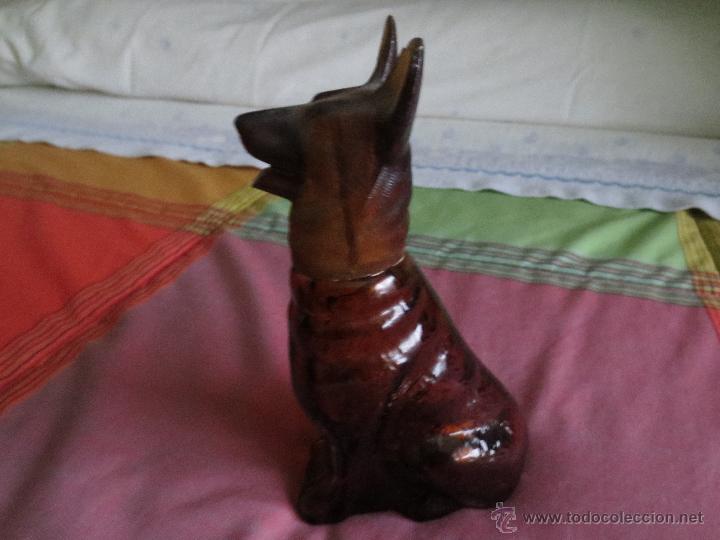 Miniaturas de perfumes antiguos: antiguo frasco de perfume colonia. perro. pastor aleman.