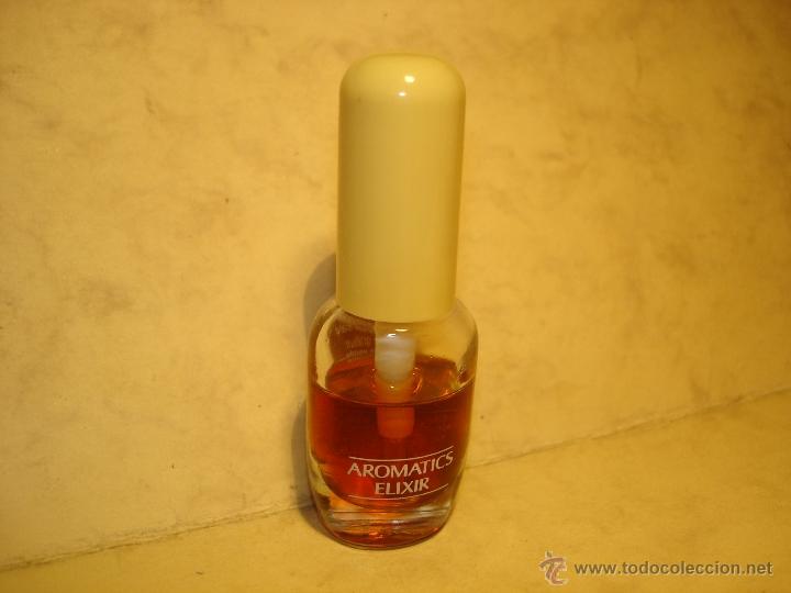 Miniaturas de perfumes antiguos: AROMATICS ELIXIR - 73 MM. DE ALTURA - CON MAS DE LA MITAD DEL CONTENIDO