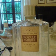Miniaturas de perfumes antiguos: FRASCO COLONIA ROYALE AMBREE. GRANDE Y TAPÓN DE BAQUELITA. Lote 45910969