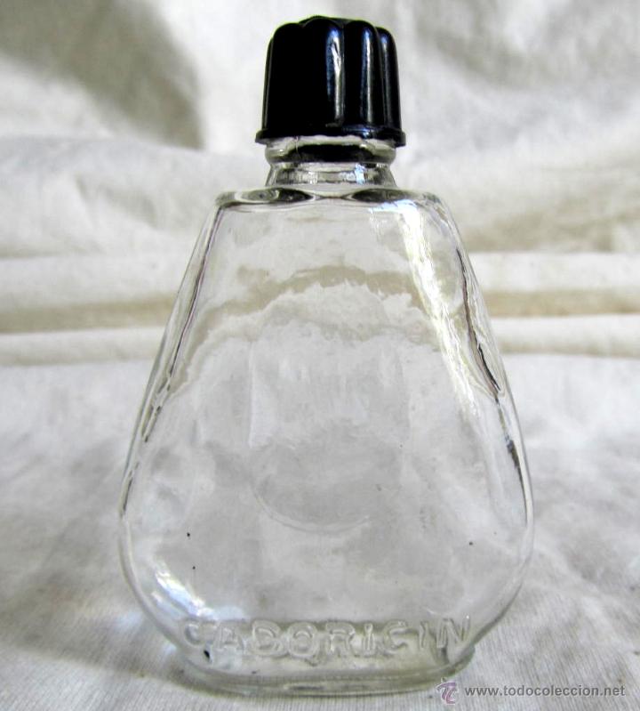 Miniaturas de perfumes antiguos: Botellita de productos para el peinado Cadoricin a&ntilde;os 50-60