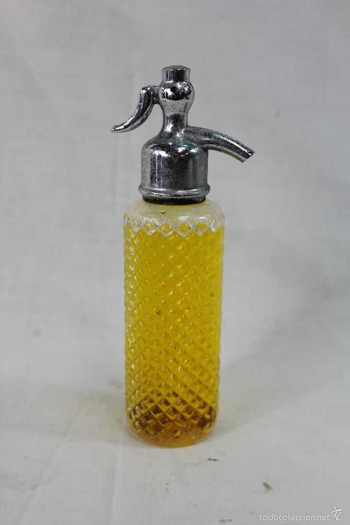 Miniaturas de perfumes antiguos: botella avon wild country - Foto 1