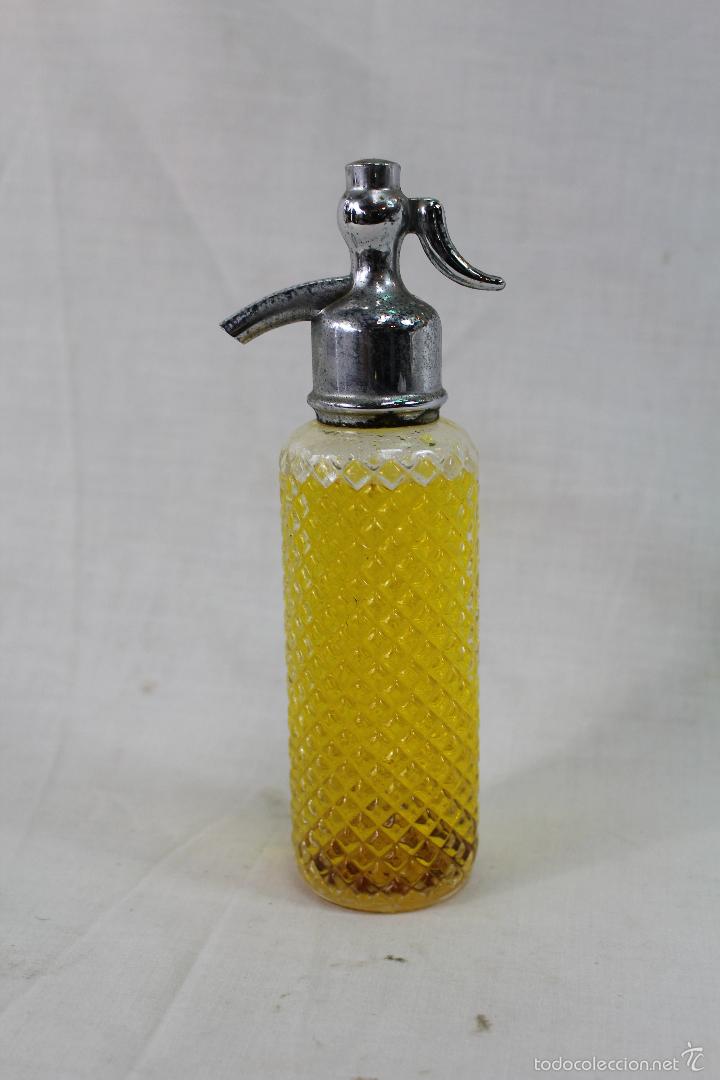 Miniaturas de perfumes antiguos: botella avon wild country - Foto 3