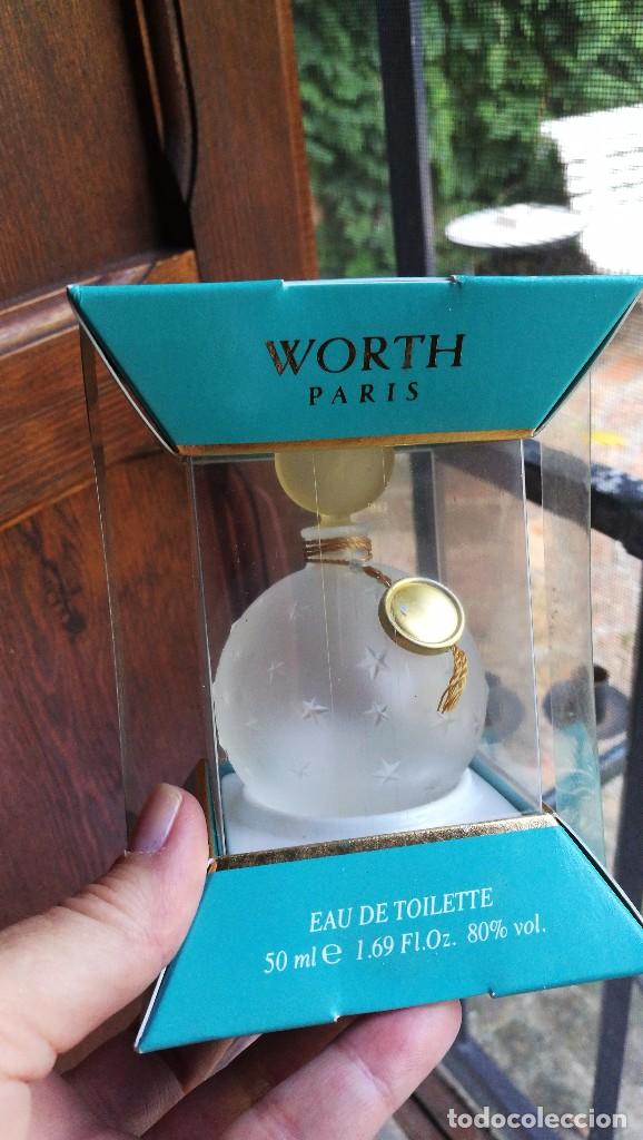 Miniatures of antique perfumes: JE REVIENS DE WORTH.