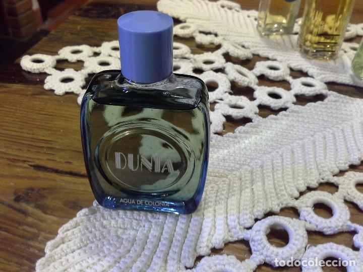 Miniaturas de perfumes antiguos: DUNIA AGUA DE COLONIA, 30 ML.