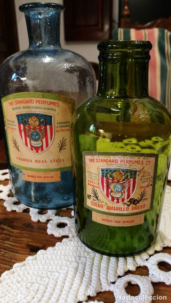 Miniatures of antique perfumes: LOTE 2 ANTIGUOS FRASCOS DE COLONIA de THE STANDARD PERFUMES, SARRI&Aacute;-BARCELONA.