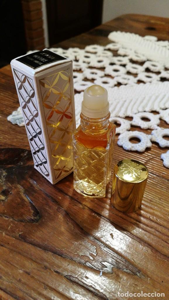 Miniaturas de perfumes antiguos: AVON ROLLON. - Foto 5