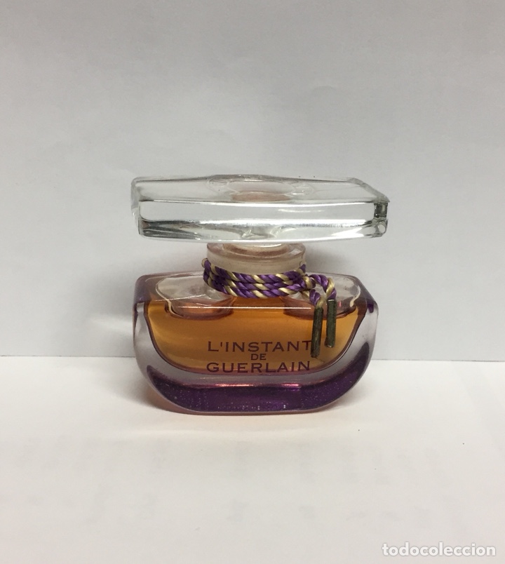 Miniatures of antique perfumes: Puro perfume L&rsquo;instant de Guerlain. Tap&oacute;n de cristal. 7,5ml.