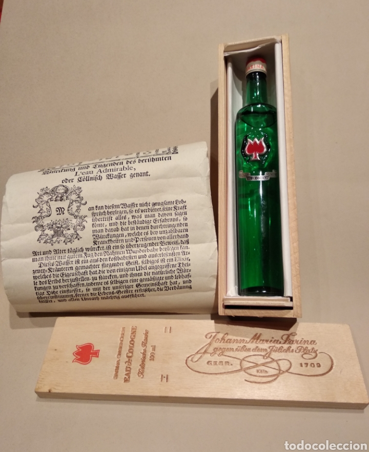 Miniaturas de perfumes antiguos: Perfume Johann Maria Farina , en estuche de madera y con pergamino .