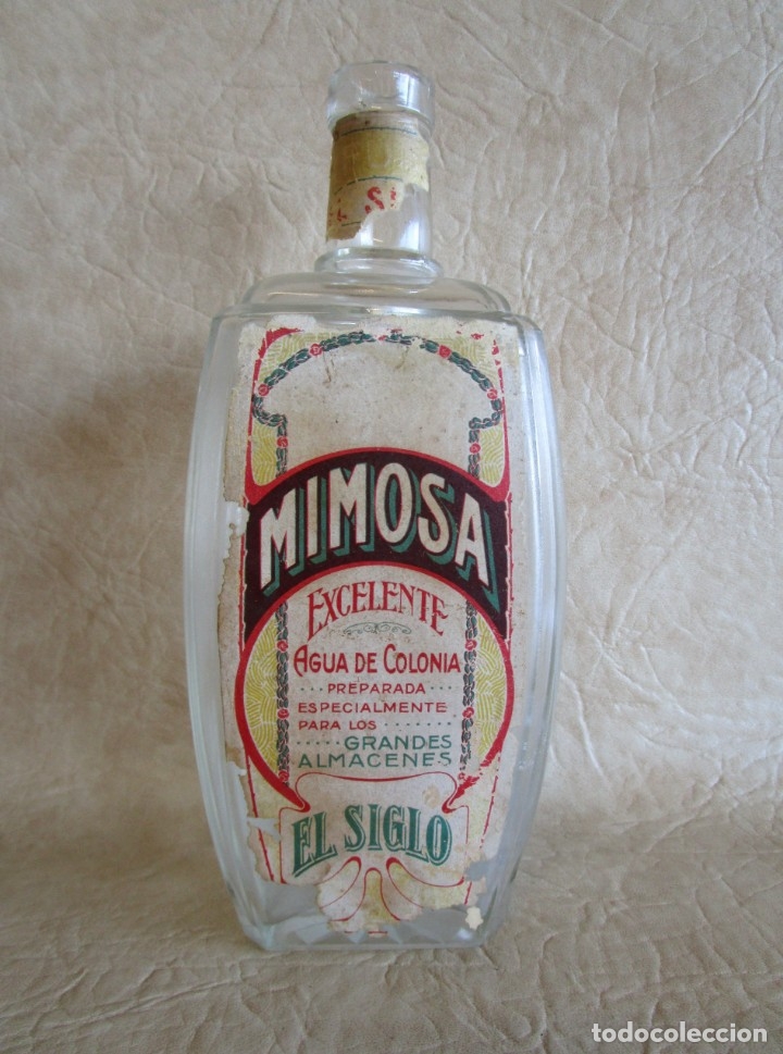 Miniatures of antique perfumes: antigua botella agua de colonia mimosa almacenes el siglo barcelona