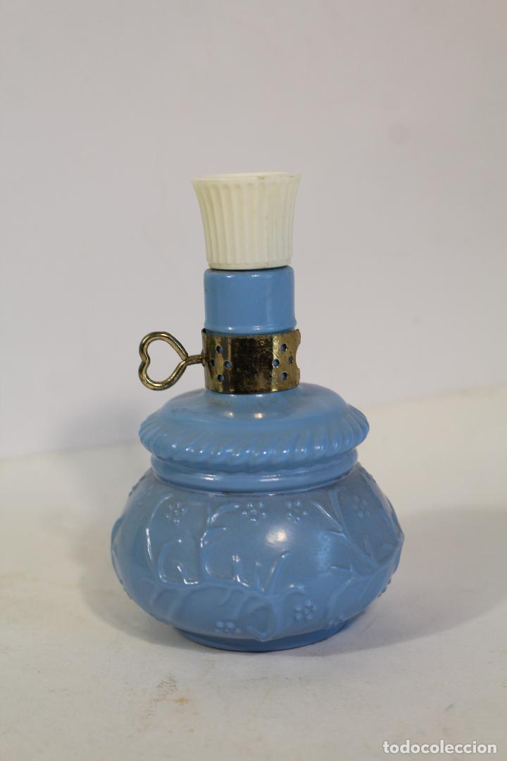 Miniaturas de perfumes antiguos: BOTELLA QUINQUE COLONIA AVON - Foto 1