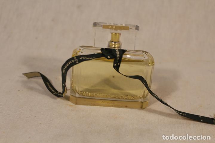 Miniaturas de perfumes antigos: ferfume ficticio dummy roberto verino