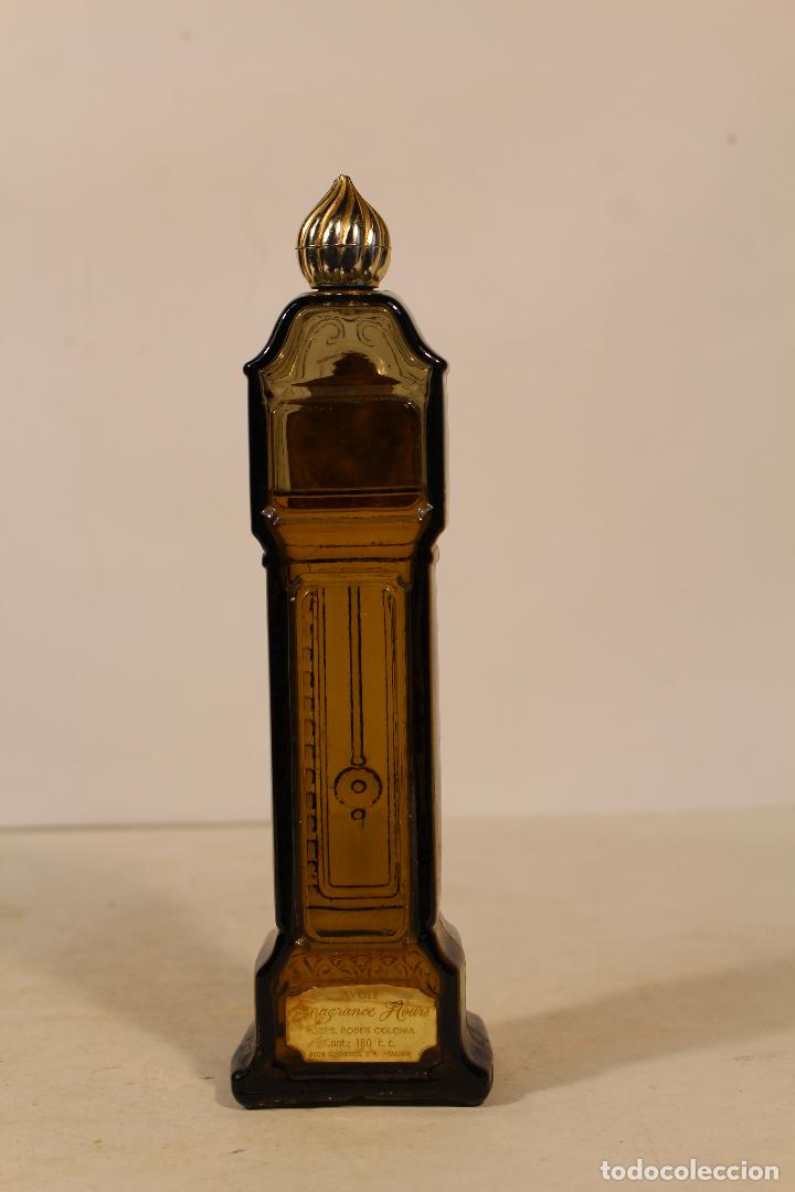 Miniaturas de perfumes antiguos: botella reloj - colonia avon - Foto 2