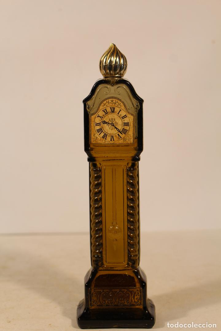 Miniaturas de perfumes antiguos: botella reloj - colonia avon - Foto 1