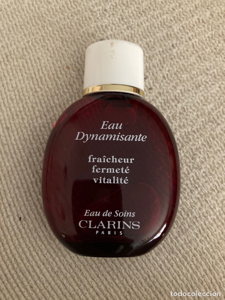 Miniaturas de perfumes antiguos: Botella Eau Dynamisante de Clarins 30 ml