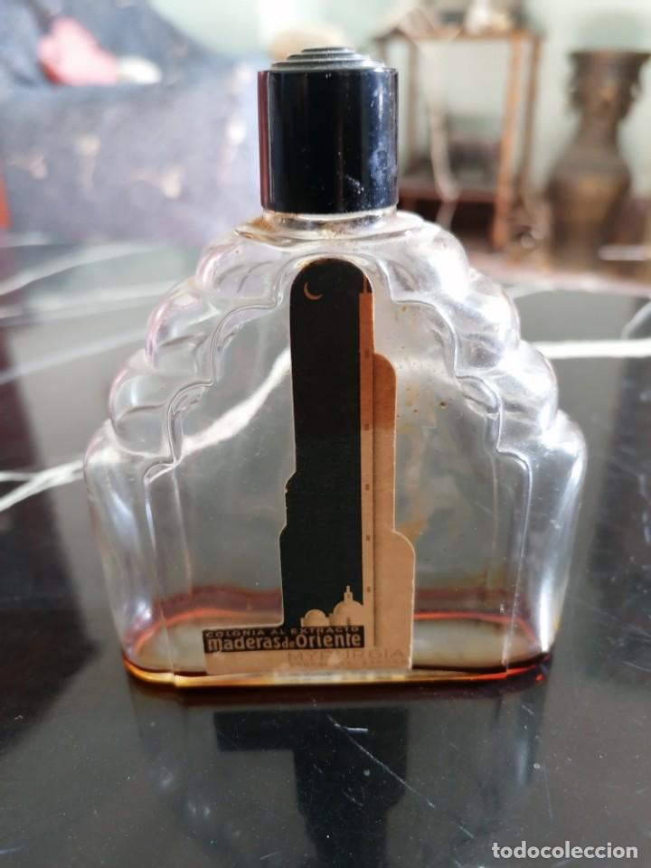 Miniaturas de perfumes antiguos: FRASCO MADERAS DE ORIENTE - Foto 1