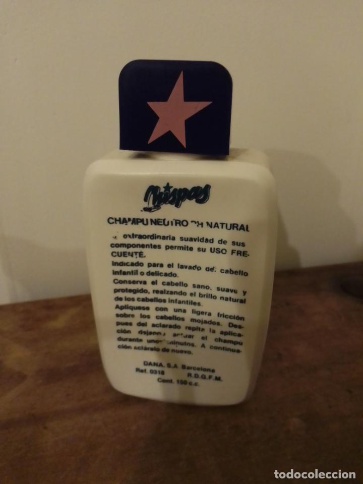 Miniaturas de perfumes antiguos: Botella Champ&uacute; Chispas .Dana . - Foto 2
