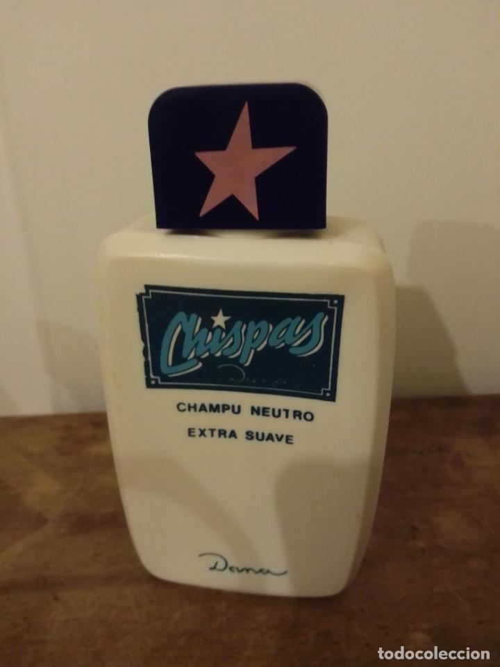 Miniaturas de perfumes antigos: Botella Champ&uacute; Chispas .Dana .