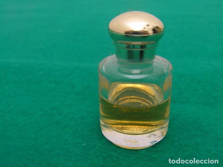 Miniaturas de perfumes antigos: Frasco de colonia de vidrio 1/2 lleno de la marca LAURA - Pontevedra.&iquest;A&ntilde;os 80?.12 ml. capacidad.