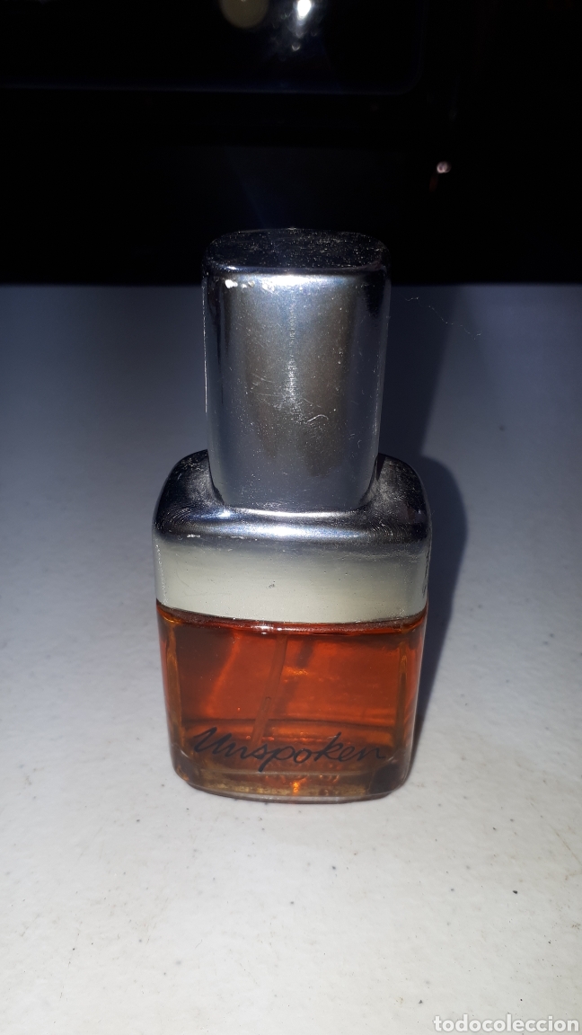 Miniaturas de perfumes antiguos: Vaporizador UNSPOKEN DE AVON DE 53 ML. LLENO
